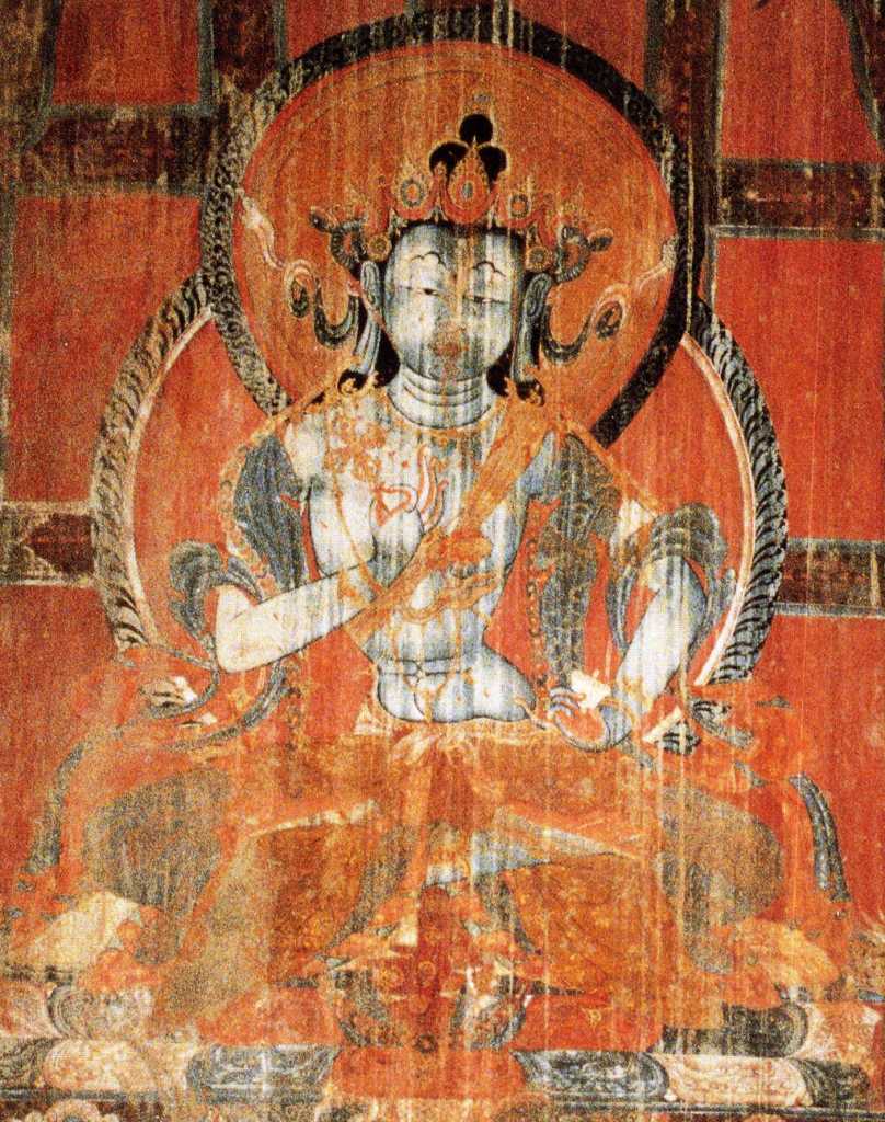 Tibet Guge 03 Tholing 07 White Temple 05 Vajravidarana On the left wall is a painting of Vajravidarana, a purification deity who holds a double vajra in her right hand and an upside down bell with a similar handle in her left hand at her hip. Photo - Hein/Boelmann: Tibet � Der Wei�e Tempel von Tholing.